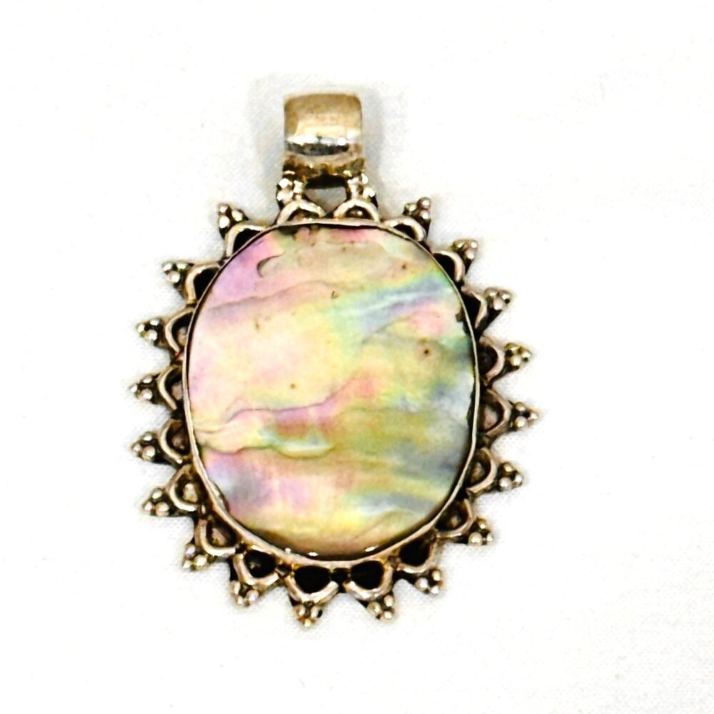 One of a Kind Iridescent mother of pearl in Unique Sterling Silver Setting